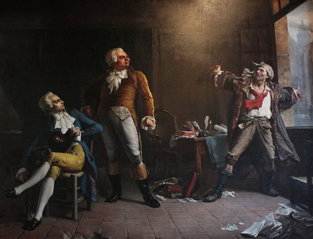 Pintura histórica con Jean-Paul Marat gesticulando enérgicamente ante Robespierre y Danton en un despacho.